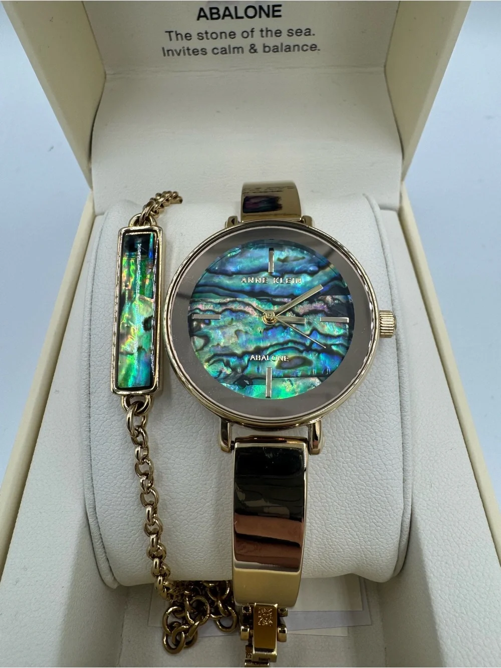 Anne Klein Gold-Tone Watch with Iridescent Abalone Dial and Bracelet Accent
